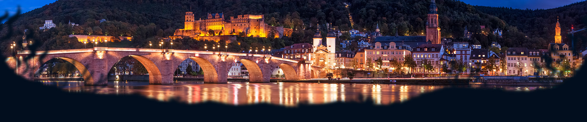 Kopfgrafik mit Blick auf Heidelberg bei Nacht